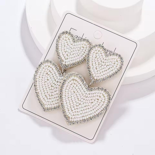 White Hearts Statement Earrings